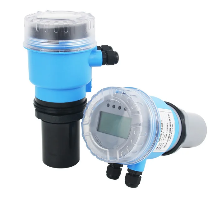 Two ultrasonic level sensors with blue housings and local displays